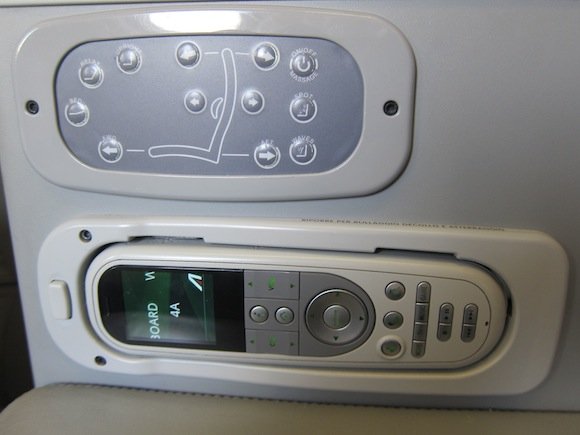 Entertainment and seat controls on side of seat