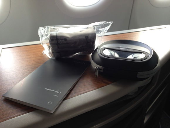 Menu, headphones and amenity kit