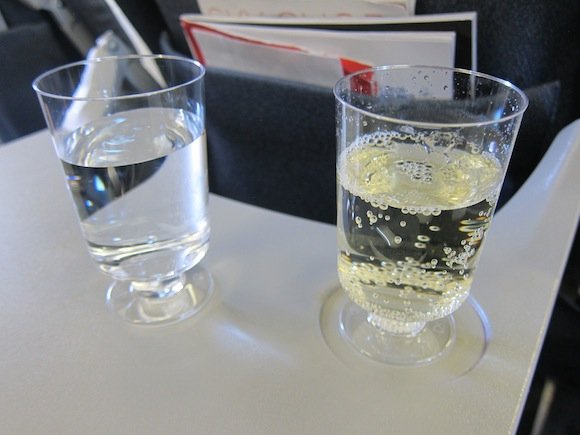 Pre-departure beverages - water and champagne