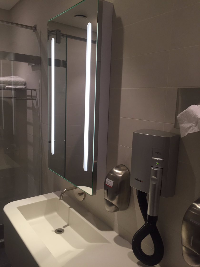Business class lounge shower room sink area