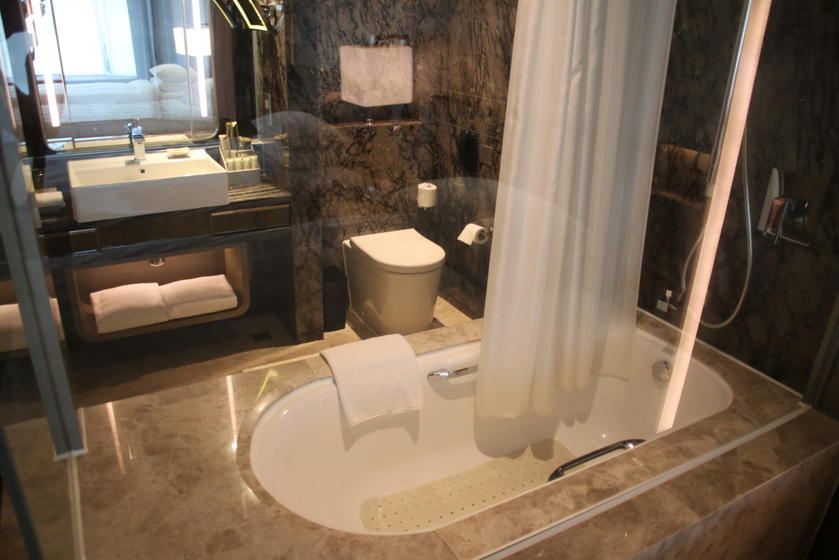The bathroom is the curtain raised.