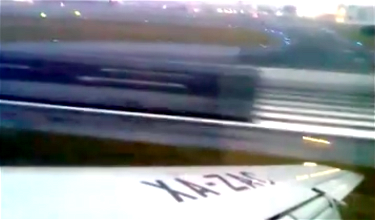 Crazy Footage Of A Plane Missing The Runway On Landing. By A Lot.