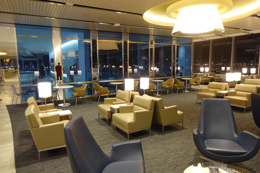 Seating area inside a United Club lounge at Los Angeles International Airport