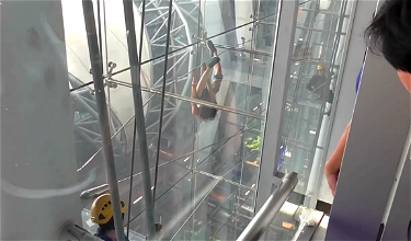 Video: Woman Dangles From Cables For Hours At Bangkok Airport