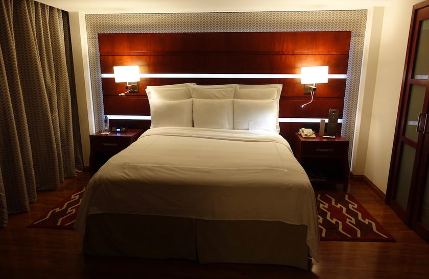 Hotel bed with square pillows at JW Marriott Quito