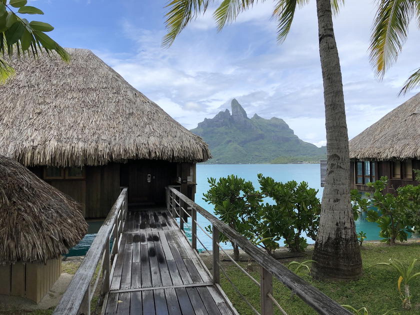 Overwater bungalows and lagoon view at the St. Regis Bora Bora in French Polynesia