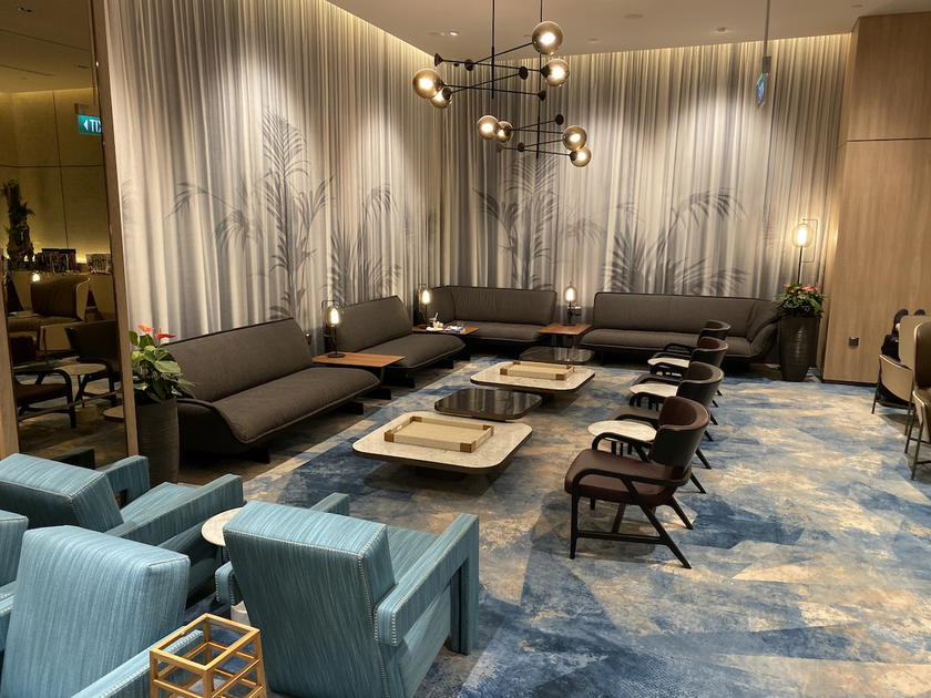 Priority Pass lounge at Singapore Changi Airport's Jewel with seating and food displays