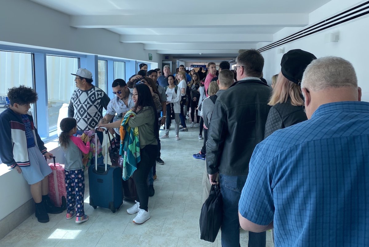 Cancun Airport Immigration Mess - One Mile at a Time
