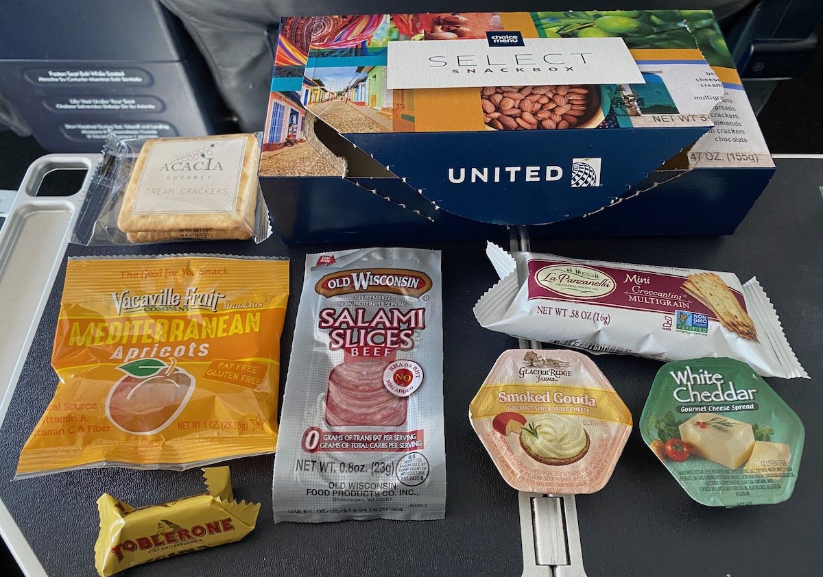 Child Self-Destructs Over Snack Box In United First Class - Live and Let's  Fly