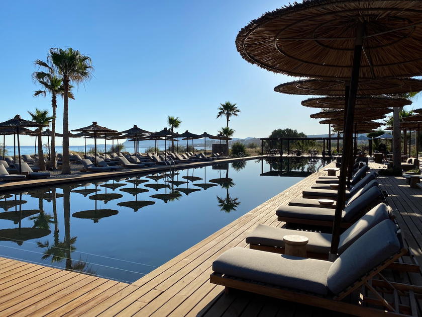 Pool and beach area at the Domes Zeen Chania resort