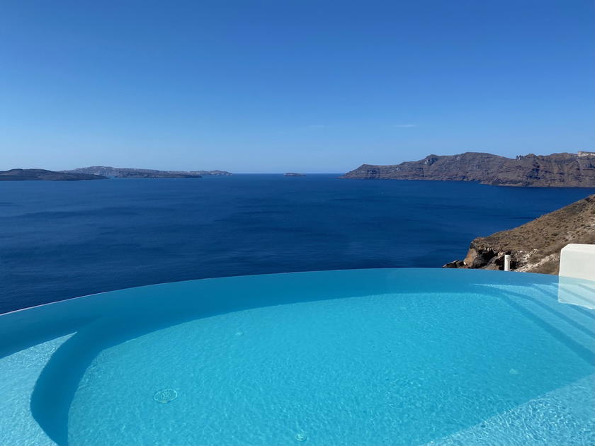Infinity pool overlooking the caldera at Mystique Santorini
