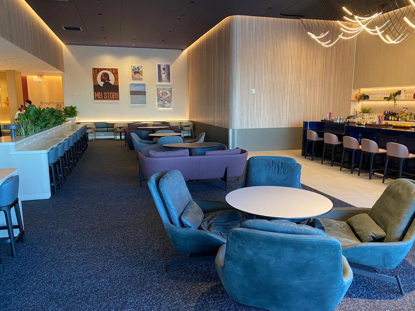 Seating area inside the Capital One Lounge at Dallas/Fort Worth airport
