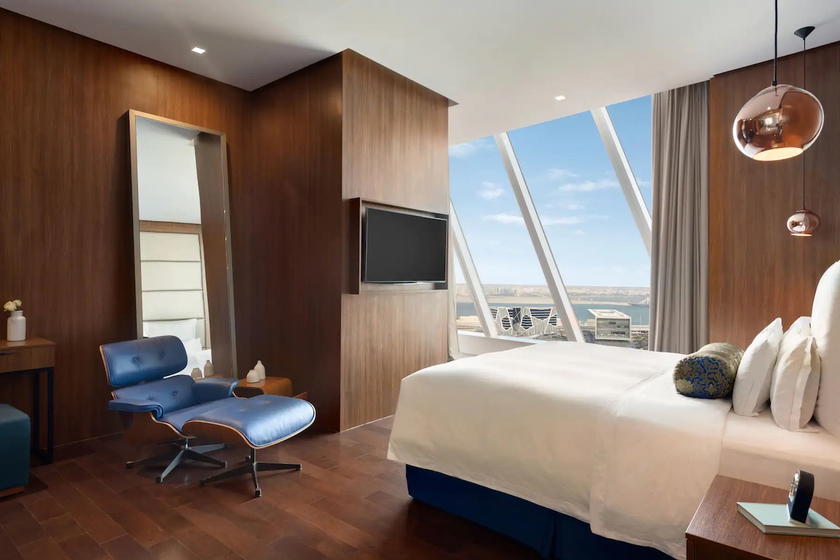 Guest room at a Wyndham Grand hotel property