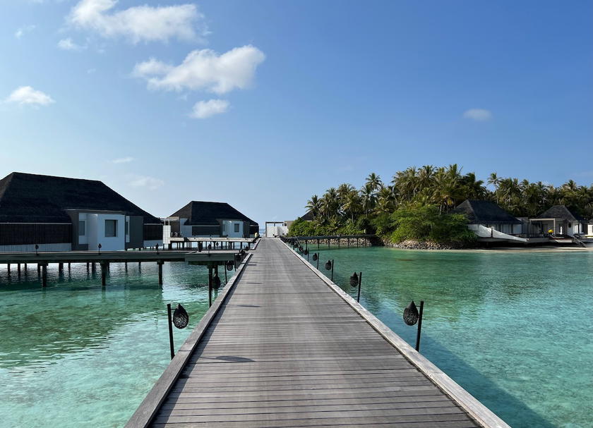Overwater villas and turquoise lagoon at Cheval Blanc Randheli resort in the Maldives