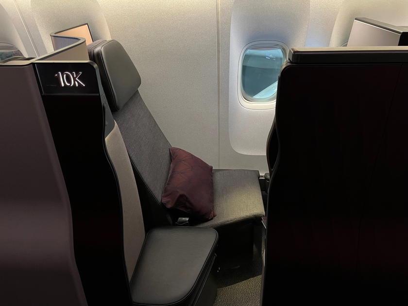 Qatar Airways Qsuites business class cabin aboard a Boeing 777