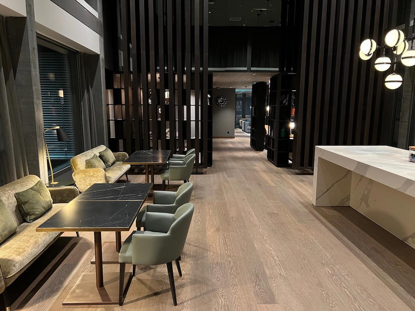 Interior of the Hyatt Regency Zurich Airport club lounge with seating and drinks display