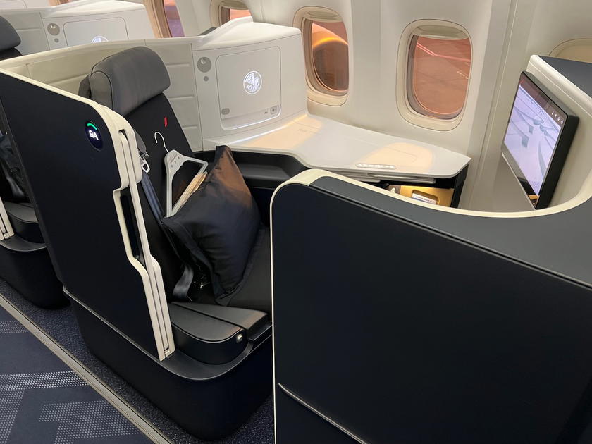 Air France business class cabin on a Boeing 777 with rows of lie-flat seats