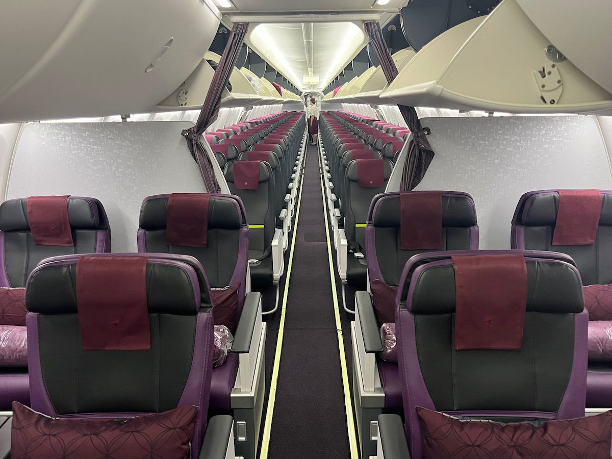 Review: Qatar Airways Boeing 737 MAX First Class (AUH-DOH) - One Mile ...