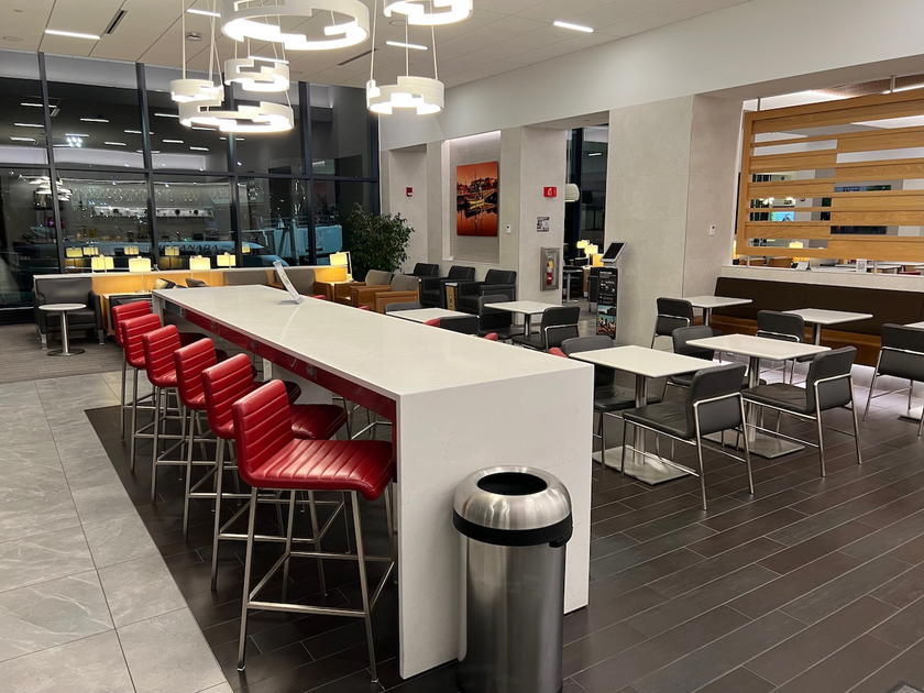 Seating area inside the American Airlines Admirals Club lounge in Boston