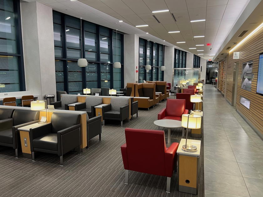 Seating area inside the American Airlines Admirals Club lounge in Boston