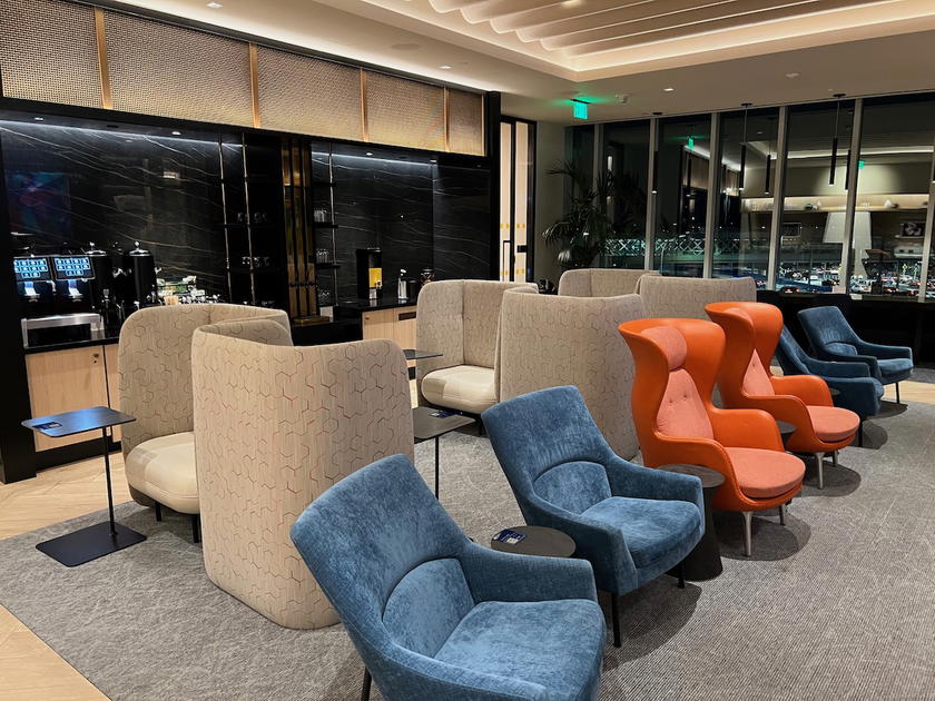 Interior seating area of the Chase Sapphire Lounge at Boston Logan Airport