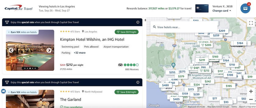 Capital One Travel hotel search results listing properties with prices and star ratings