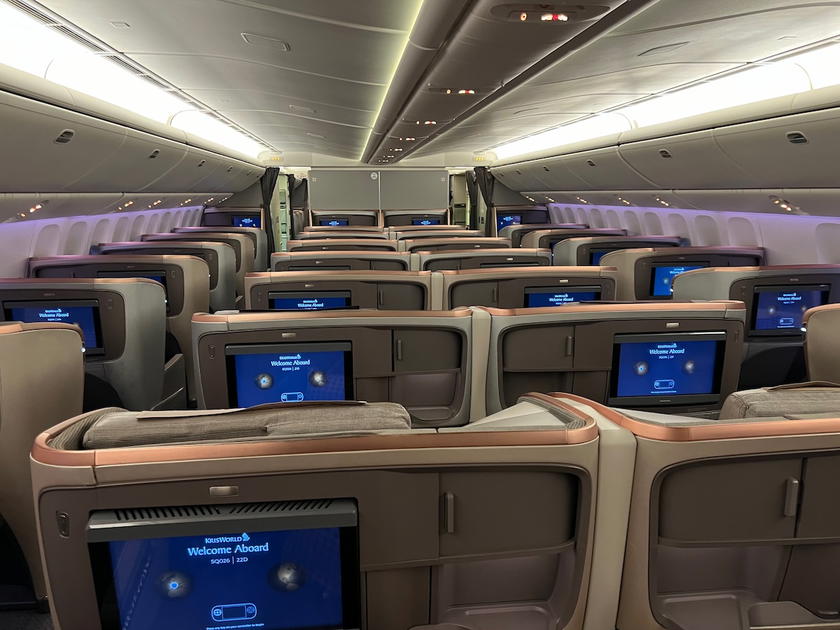 Singapore Airlines business class cabin aboard a Boeing 777