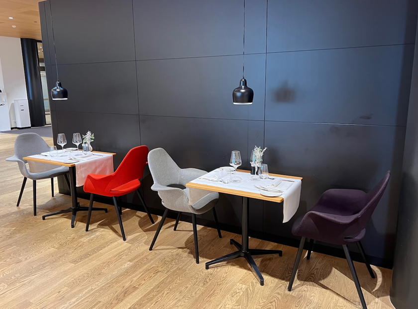 Dining area seating in the SWISS First Lounge Zurich Terminal A