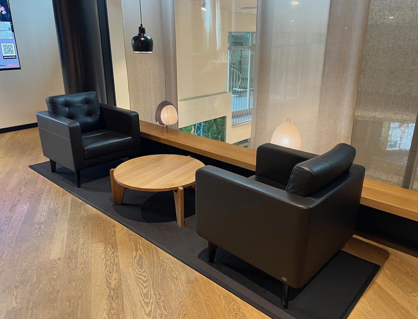 Large couches for group seating in the SWISS First Lounge Zurich Terminal A