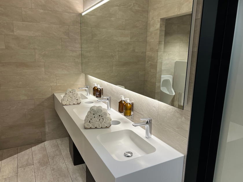 Sink and mirror area in the SWISS First Lounge Zurich restroom