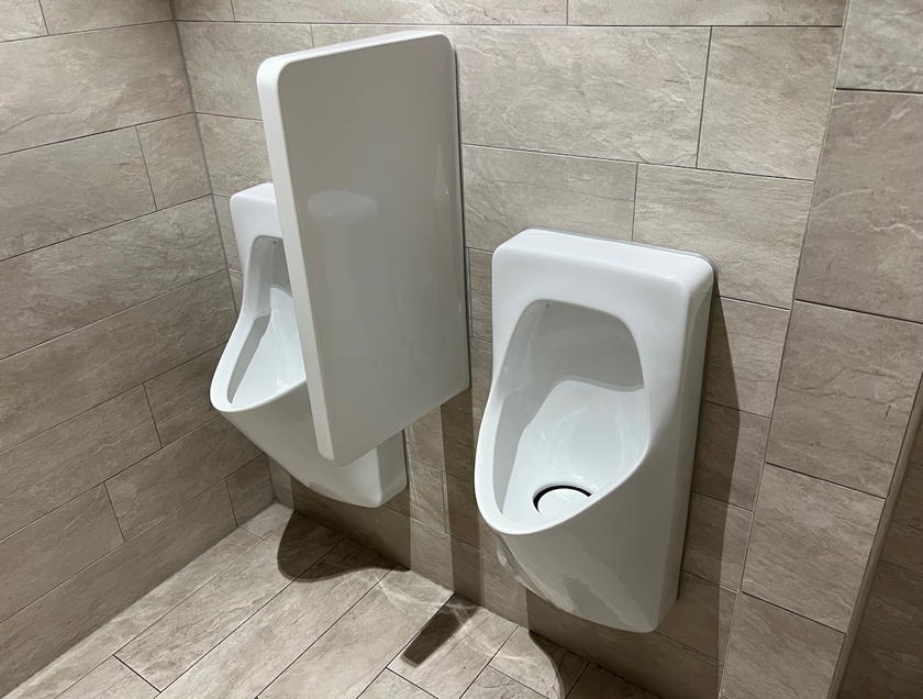 Restroom stalls in the SWISS First Lounge Zurich