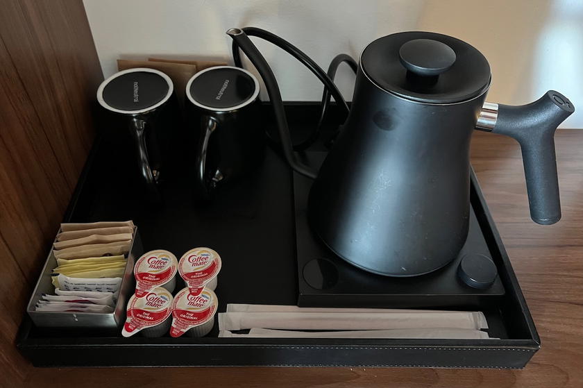 In-room coffee setup with machine and cups at Thompson Seattle