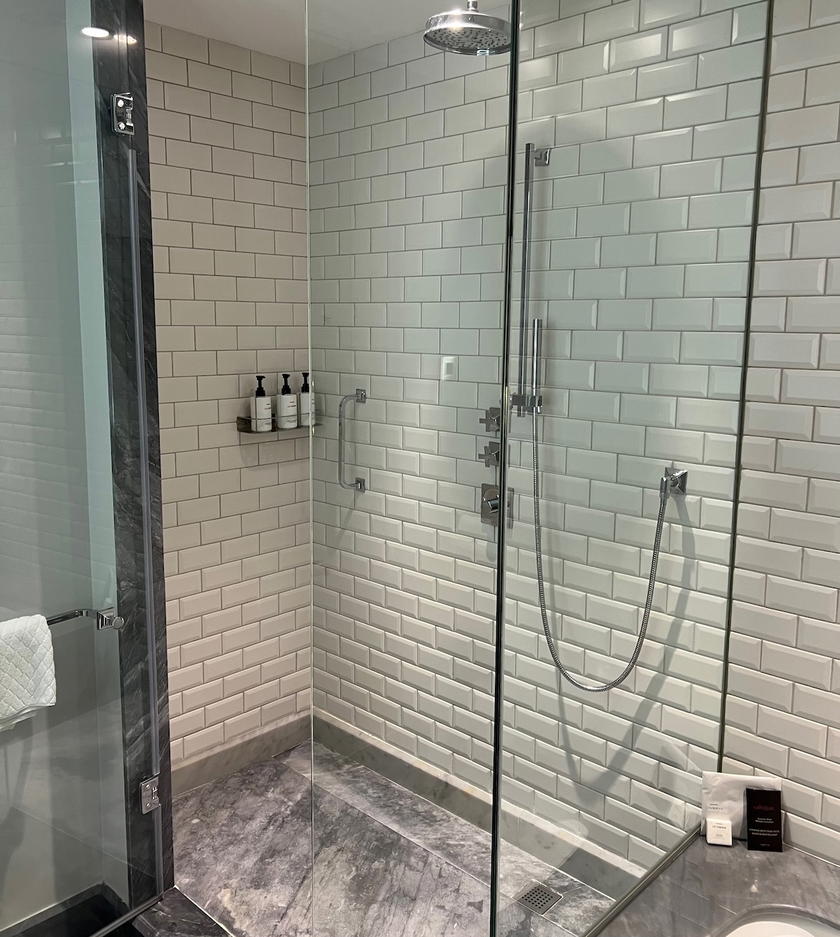 Elegant hotel bathroom with freestanding tub and shower at Hotel Maria Cristina San Sebastian