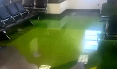 Miami Airport Terminal Flooded In Neon Green Liquid
