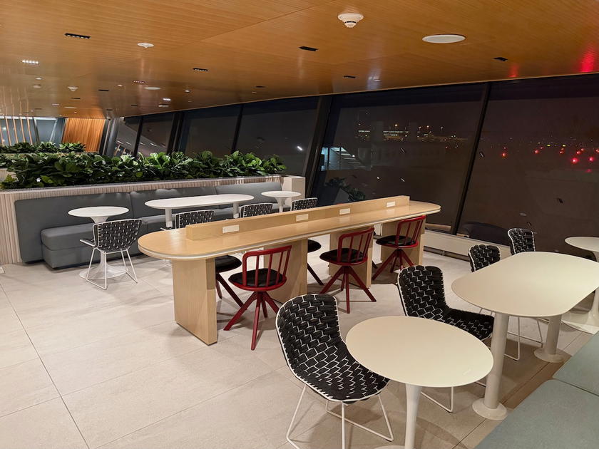 Seating area inside the Capital One Lounge at Washington Dulles International Airport