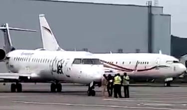 Huh: Nigerian Pilots Suspended After Nearly Running Over Five People
