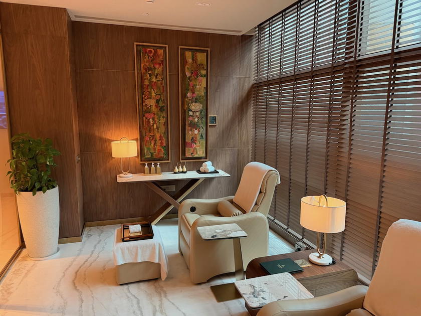 Massage chairs in the spa area of the Encalm Xenia Lounge in Delhi