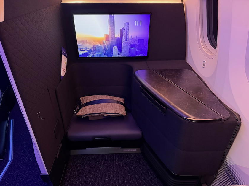 Riyadh Air Business Elite seat controls and entertainment screen