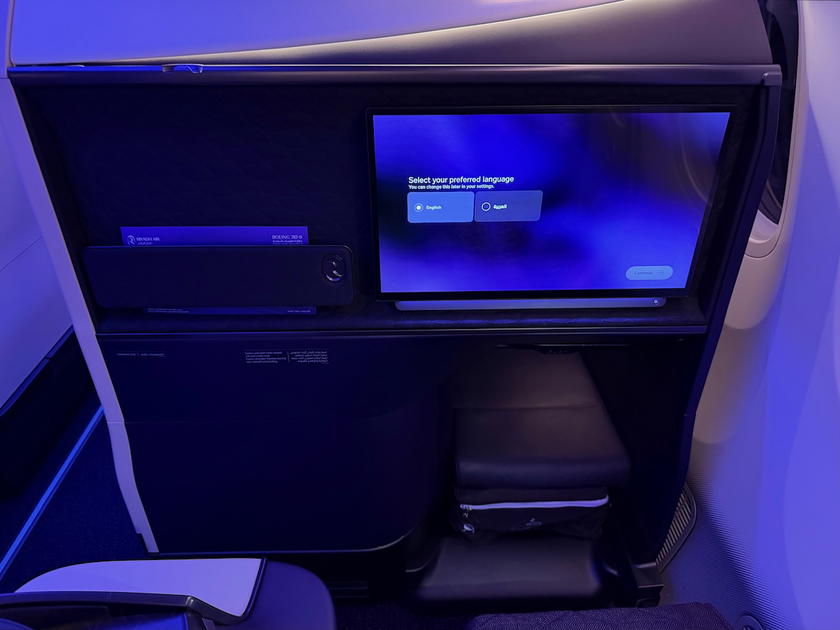 Riyadh Air business class seat with tray table extended