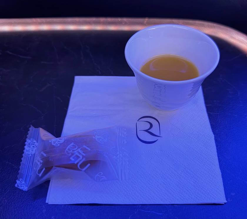 Riyadh Air business class coffee and date served before departure