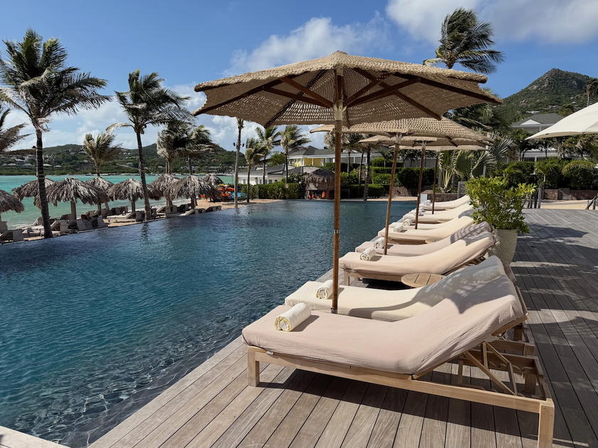 Pool at Rosewood Le Guanahani St. Barth surrounded by tropical landscaping