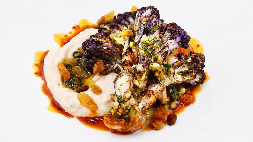 Roasted purple cauliflower steak dish from American's Flagship Dining menu