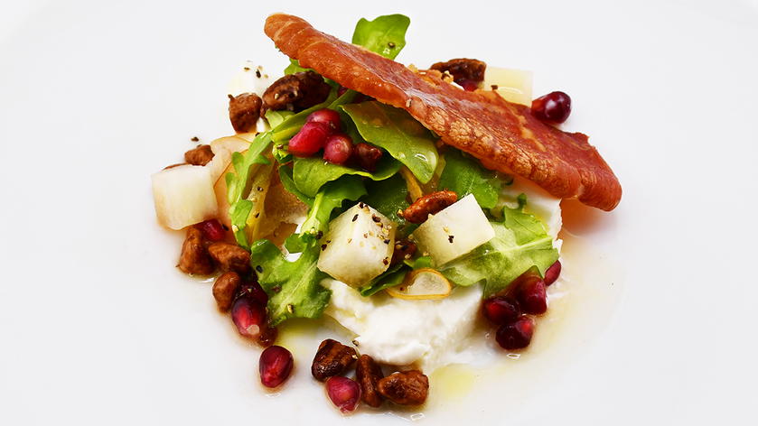 Texas pear and burrata salad served at American's Flagship Dining