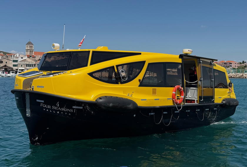 Tender boat used to shuttle guests from Four Seasons Yachts to shore
