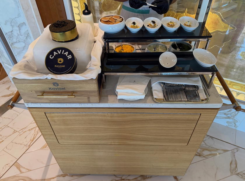 Caviar station set up for guests during check-in on Four Seasons Yachts