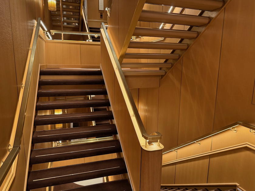 Staircase near the elevators on Four Seasons Yachts