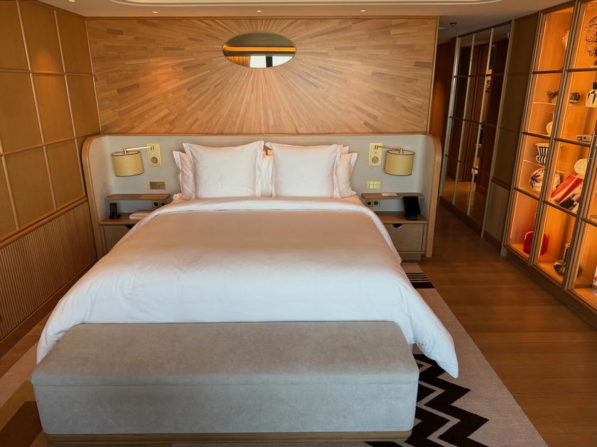 Seating area within the bedroom of a Four Seasons Yachts suite
