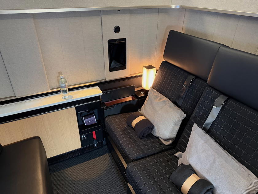 Wide view of the SWISS first class double suite with two seats side by side