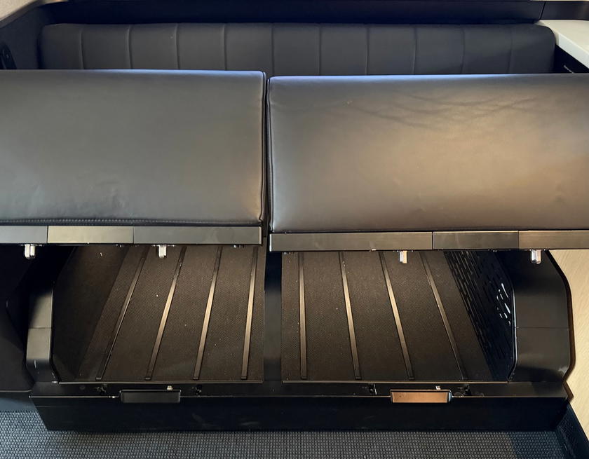 Ottoman storage space in the SWISS first class double suite