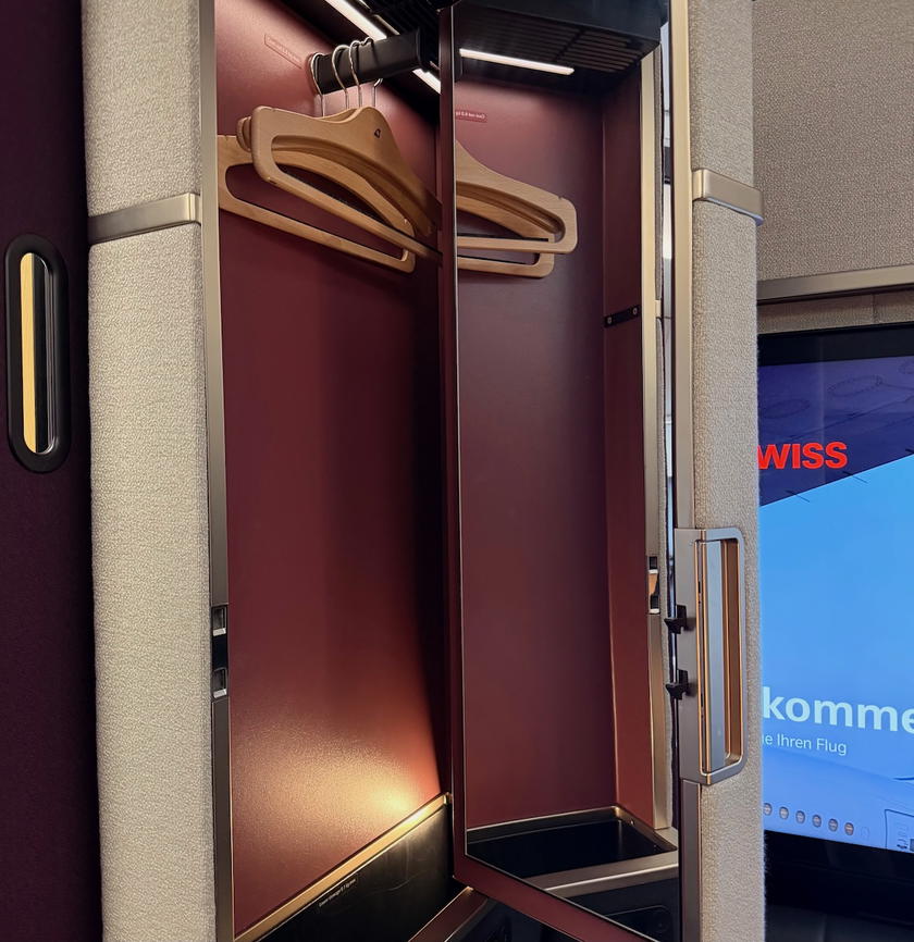 Small wardrobe beside the SWISS first class double suite seat
